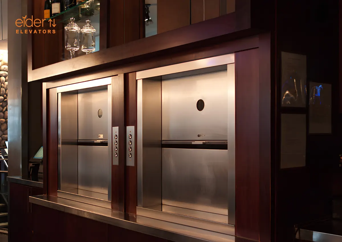 Dumbwaiter service lift set into timber panelling